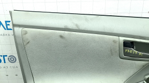 Front left door trim panel for Toyota Prius 30 10-15, gray with gray cloth insert, gray cloth armrest, gray molding structure, with handle, scratches, needs cleaning, crack in fastener