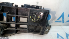 The front bumper mount, right, for a Lexus ES300h ES350 13-18, has a broken latch.