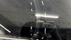 The trunk door is bare with glass, Volvo XC90 16-22 tinted, black 717, scratches on the glass.