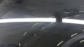 The trunk door is bare with glass, Volvo XC90 16-22 tinted, black 717, scratches on the glass.