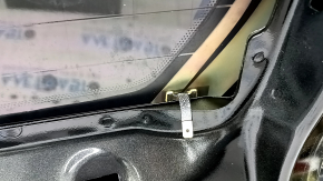 The trunk door is bare with glass, Volvo XC90 16-22 tinted, black 717, scratches on the glass.