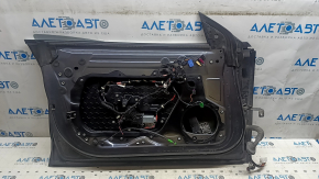 Tesla Model 3 front left door assembly, 18-20 PMNG graphite, scratch, chip, and scratches on the molding