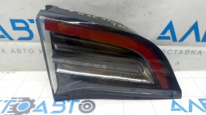 Tesla Model 3 18-Type 2 left inner trunk lid light, cracks, scratches