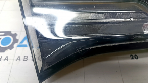 Tesla Model 3 18-Type 2 left inner trunk lid light, cracks, scratches