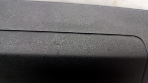 Tesla Model 3 18 driver's knee airbag, left, black