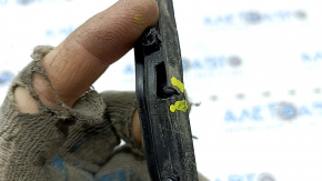 The hood-to-bumper seal on a Hyundai Ioniq 17-22 is torn.