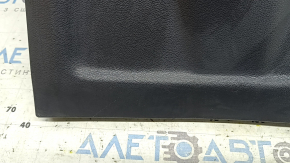 The rear driver's seat cover for a 2022 Hyundai Ioniq is black, with cracks in the fasteners and scratches.