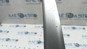 Hyundai Ioniq 20-22 HEV, PHEV front bumper center trim, gray, broken mount, impacts, sand