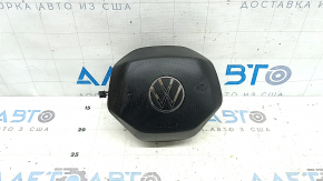 The driver's side airbag in the VW Tiguan 22-24 is black and has a rusty squib.