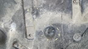 The front bumper guard for a Toyota Camry v70 18-24 is dented, torn, and worn.