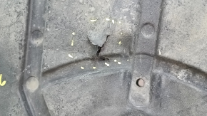The front bumper guard for a Toyota Camry v70 18-24 is dented, torn, and worn.