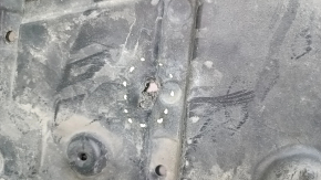 The front bumper guard for a Toyota Camry v70 18-24 is dented, torn, and worn.