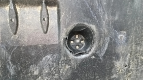 The front bumper guard for a Toyota Camry v70 18-24 is dented, torn, and worn.
