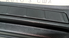Volvo XC40 19-25 trunk opening trim, black, worn