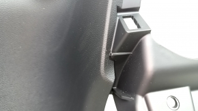 Volvo XC40 19-25 black, lower center dashboard trim, scratches