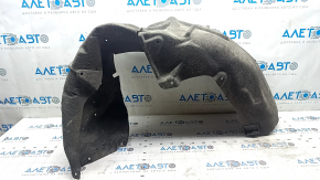 Tesla Model 3 18 rear left fender liner - dented, worn, with torn fasteners