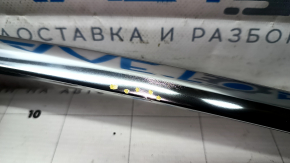 Tesla Model 3 right roof trim (18" chrome, dents, scratches)