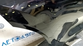 The bare rear right door of a Volvo XC40 19-25 black 717, dent, scratches
