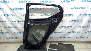 The bare rear right door of a Volvo XC40 19-25 black 717, dent, scratches