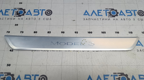 Tesla Model 3 18" front left outer door sill trim - chrome, chipped