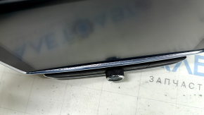 The chrome on the Buick Encore 18-21 navigation system is swollen.