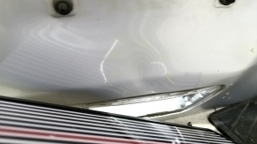 The tailgate is bare, dented, and has dents, for a 19-24 Ford Edge UX silver.