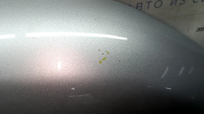 Ford Edge 19-24 UX Silver Steel Hood with dents, dents, chips, and rust.