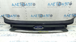 Ford Edge 19-24 trunk lid trim with chrome molding and emblem, torn seal