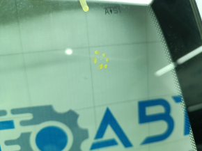 Buick Encore 13-22 windshield with air along the edge, chips, broken guides