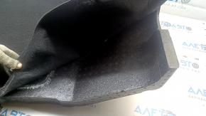 The front left floor covering of a Tesla Model Y 20-25 is black, the insulation is peeling off.