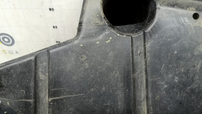 Right trunk protection for Ford Edge 15-21 is worn and dented.