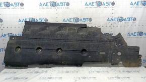 Left underbody protection for Ford Edge 15-24 is worn, dented, and the fastening is torn.