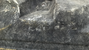 Left underbody protection for Ford Edge 15-24 is worn, dented, and the fastening is torn.