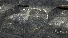 Left underbody protection for Ford Edge 15-24 is worn, dented, and the fastening is torn.