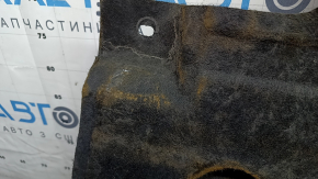 Left underbody protection for Ford Edge 15-24 is worn, dented, and the fastening is torn.