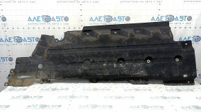 The right underbody protection of a Ford Edge 15-24 is worn and torn.