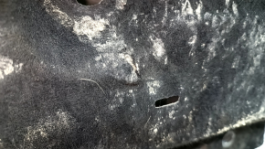 The right underbody protection of a Ford Edge 15-24 is worn and torn.