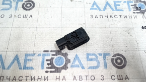 The tailgate release button on a Ford Edge 15-23 is worn out.
