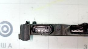 The foot-operated trunk release unit for the Audi A4 B9 17-23 has a broken mount.