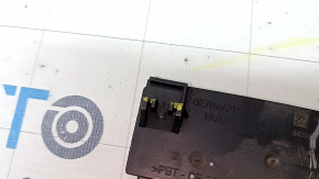 The foot-operated trunk release unit for the Audi A4 B9 17-23 has a broken mount.
