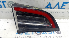 The left inner taillight on the Tesla Model Y 20-25 Type 1 has scratches and is peeling off.