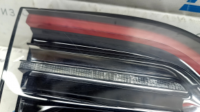 The left inner taillight on the Tesla Model Y 20-25 Type 1 has scratches and is peeling off.