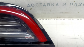 The left inner taillight on the Tesla Model Y 20-25 Type 1 has scratches and is peeling off.