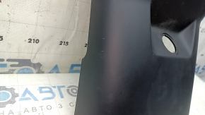 Volvo XC60 18-25 black rear lower center console trim, under the cigarette lighter, scratches