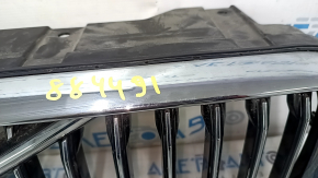 Radiator grille with Volvo XC60 18-21 badge under the camera