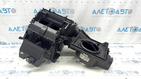 The bare heater housing and ventilation of the Buick Encore 13-22