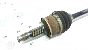 The rear right axle shaft of a Buick Encore 13-22 is rusty.