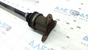 The rear right axle shaft of a Buick Encore 13-22 is rusty.