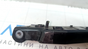 The right front bumper mount for a Tesla Model Y 20-25 is broken.