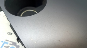 Tesla Model Y 20-25 center console cup holders, gray trim, backlit, scratches, bulging